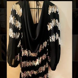 Black and Silver evening dress that drapes in the front with sheer sleeves